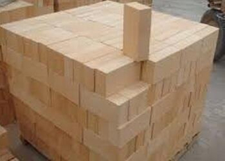Refractory bricks and refractory cements